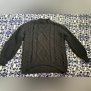 black turtleneck knit sweater